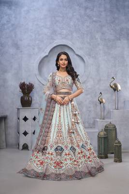Stunning sky blue Lehenga with Zari Paisley Embroidery, Silk Patches, and Regal Peacock Motifs 1