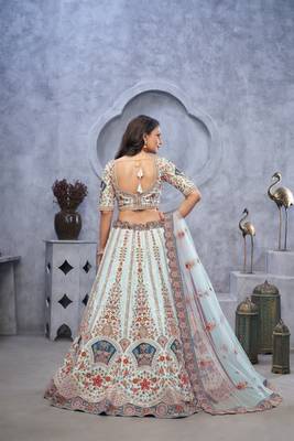 Stunning sky blue Lehenga with Zari Paisley Embroidery, Silk Patches, and Regal Peacock Motifs 4