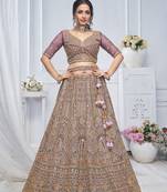 Royal Grandeur bridal  Purple Soft Net Lehenga with Paisley and Peacock Motifs & Heavy Embroidery