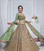 Green Net Threadwork and Sequins Embroidered Lehenga