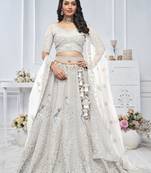 Whimsical White  Embroidered bridal wear lehenga