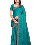 Turquoise embroidered satin saree with blouse piece