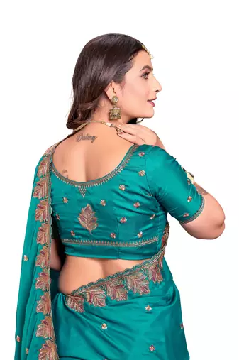 Turquoise embroidered satin saree with blouse piece