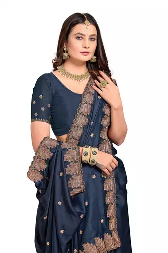 Teal embroidered satin saree with blouse piece