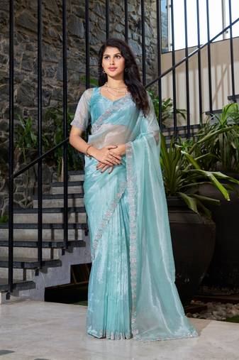 Turquoise embroidered organza saree with blouse piece