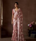 Peach embroidered satin saree with blouse piece