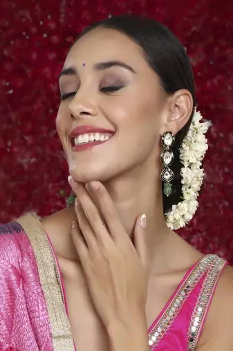 Long meenakari kundan earrings with emeralds