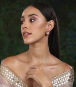 Tear drop maroon studs