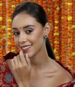 Kundan studs with green stone