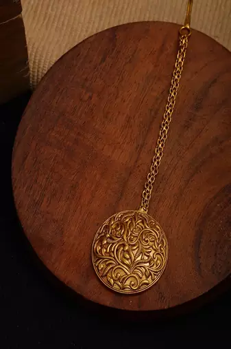 Golden maang tikka