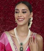 Long pearl layered necklace with pendant and matching earrings