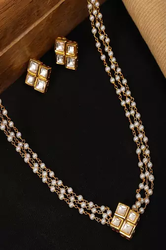 Kundan in pearl string with matching studs