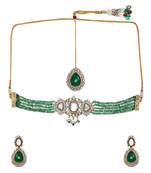 Emerald stone and mossainite kundan in green onyx with matching earrings and maang tikka