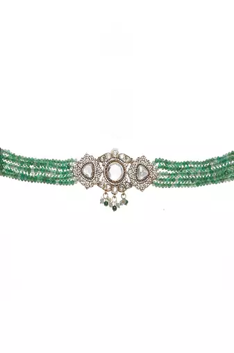 Emerald stone and mossainite kundan in green onyx with matching earrings and maang tikka