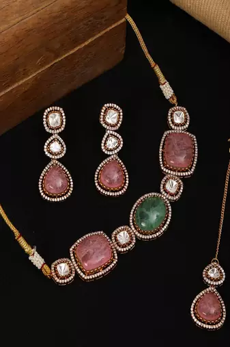 Multi stone and mossainite kundan choker with matching earrings and maang tikka