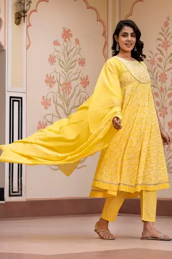 women yellow embroidered anarkali kurta bottom and dupatta set