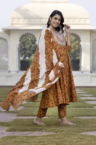 women mustard yellow chikankari anarkali kurta bottom and dupatta set
