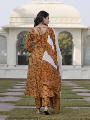 women mustard yellow chikankari anarkali kurta bottom and dupatta set 3