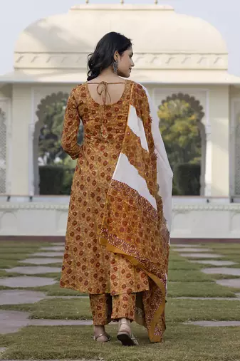 women mustard yellow chikankari anarkali kurta bottom and dupatta set