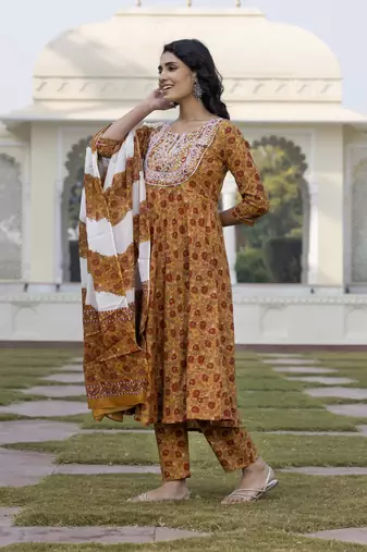 women mustard yellow chikankari anarkali kurta bottom and dupatta set