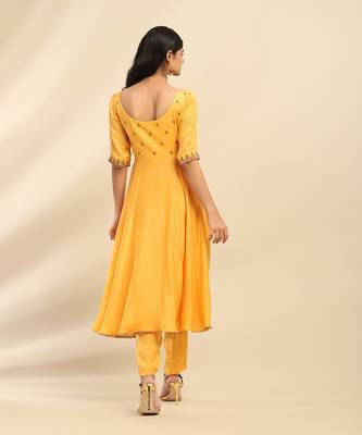 Yellow tanishqa solid anarkali kurta with pant and dupatta 2