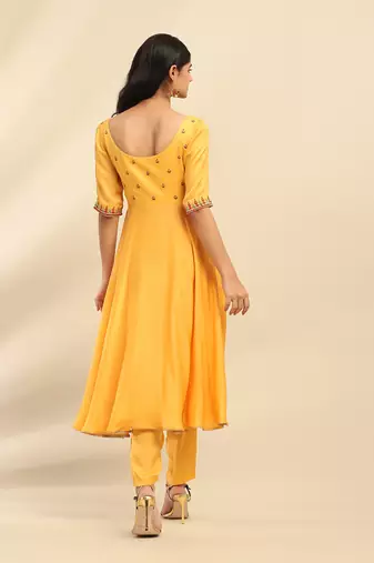Yellow tanishqa solid anarkali kurta with pant and dupatta