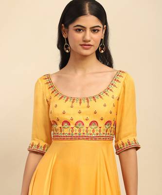 Yellow tanishqa solid anarkali kurta with pant and dupatta 3
