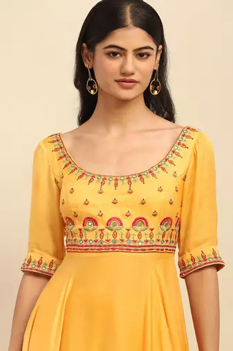 Yellow tanishqa solid anarkali kurta with pant and dupatta