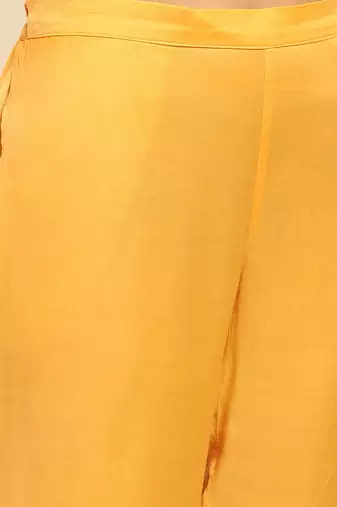Yellow tanishqa solid anarkali kurta with pant and dupatta