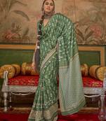Green mercerized sigma silk blend saree with aqua finish