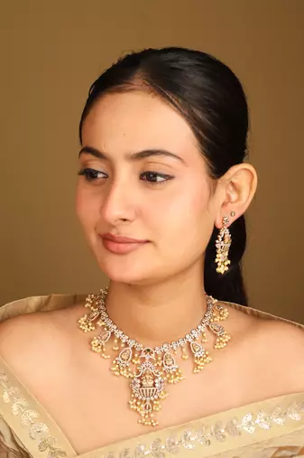 Matte gold and pearl necklace with goddess pendant