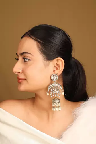 Traditional kundan gold jhumkas
