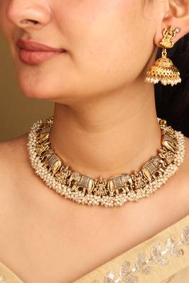 Matte gold elephant motif necklace set with pearls 1