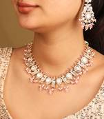 Kundan necklace set with pink accents
