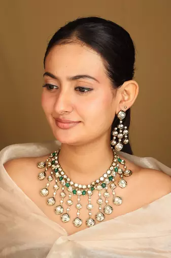 American diamond necklace set with green accents