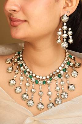 American diamond necklace set with green accents 1
