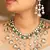 American diamond necklace set with green accents