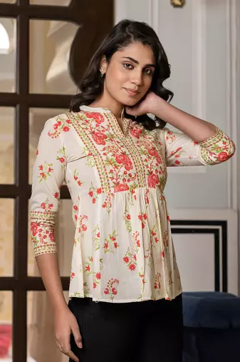 women orange and off white floral print top