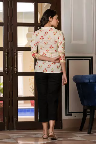 women orange and off white floral print top
