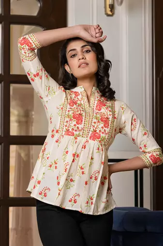 women orange and off white floral print top