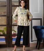 women blue and off white floral print top