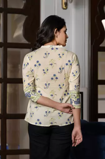 women blue and off white floral print top