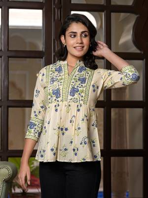 women blue and off white floral print top 4