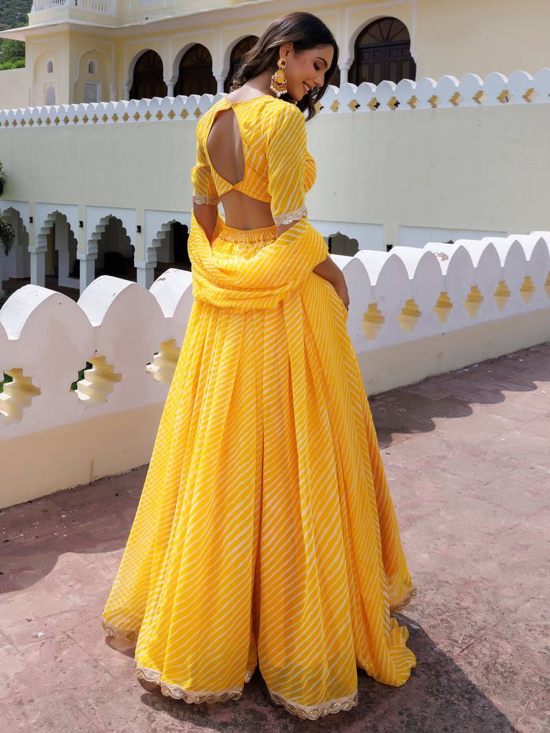 Amazing Yellow Laheriya Print Georgette Wedding Wear Lehenga Choli