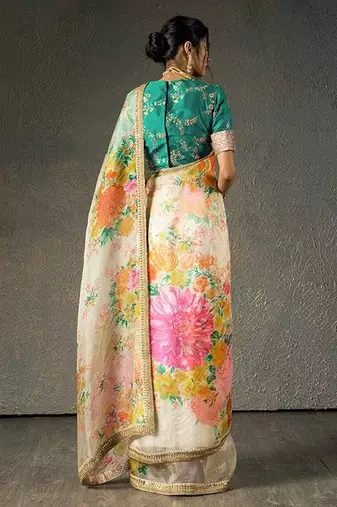 Alluring Cream Floral Orangza Wedding Wear Saree With Blouse