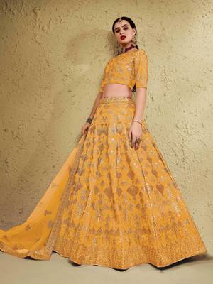 styling yellow embroidered silk bridal lehenga set choli with dupatta with dupatta 2