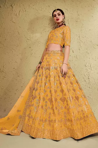 styling yellow embroidered silk bridal lehenga set choli with dupatta with dupatta