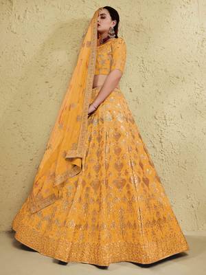 styling yellow embroidered silk bridal lehenga set choli with dupatta with dupatta 3