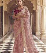 Pink party wear net saree with satin blouse fabric 