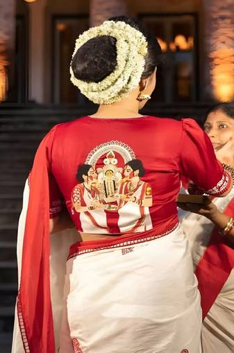 White lychee silk saree with red motifs & border